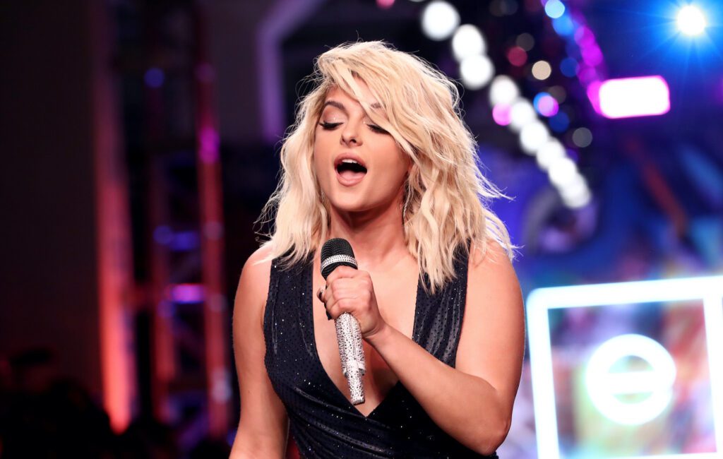 Bebe Rexha delays her new album "until the world is in a better place"