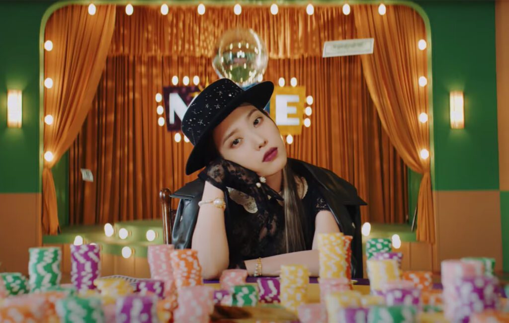 IU plays a professional gambler in retro-inspired video for ‘Coin’