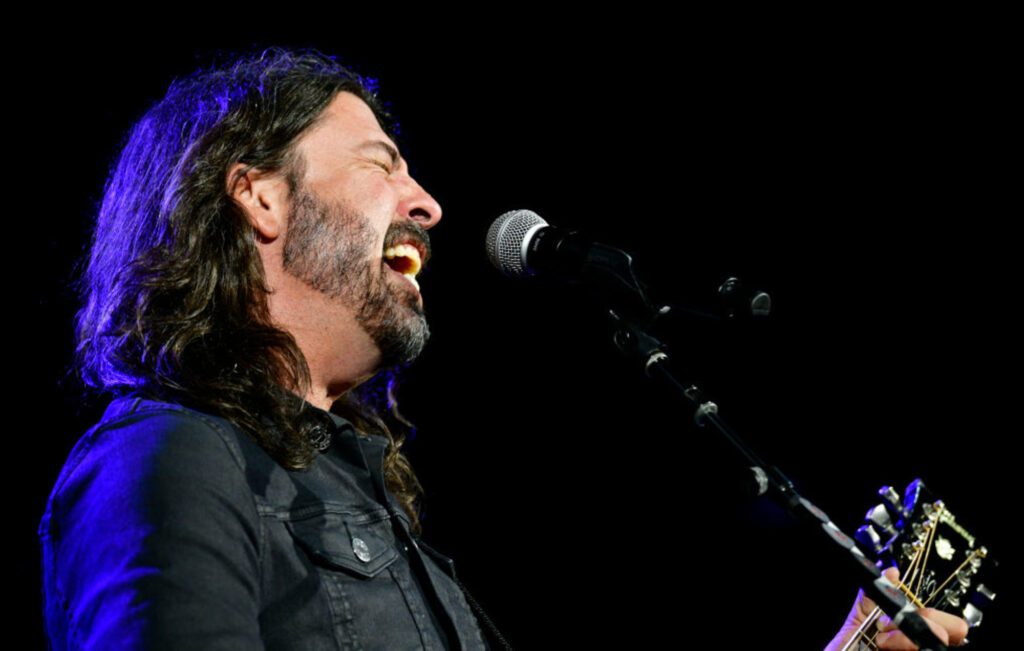 Watch Dave Grohl play drums to Nirvana's 'Smells Like Teen Spirit' during book event