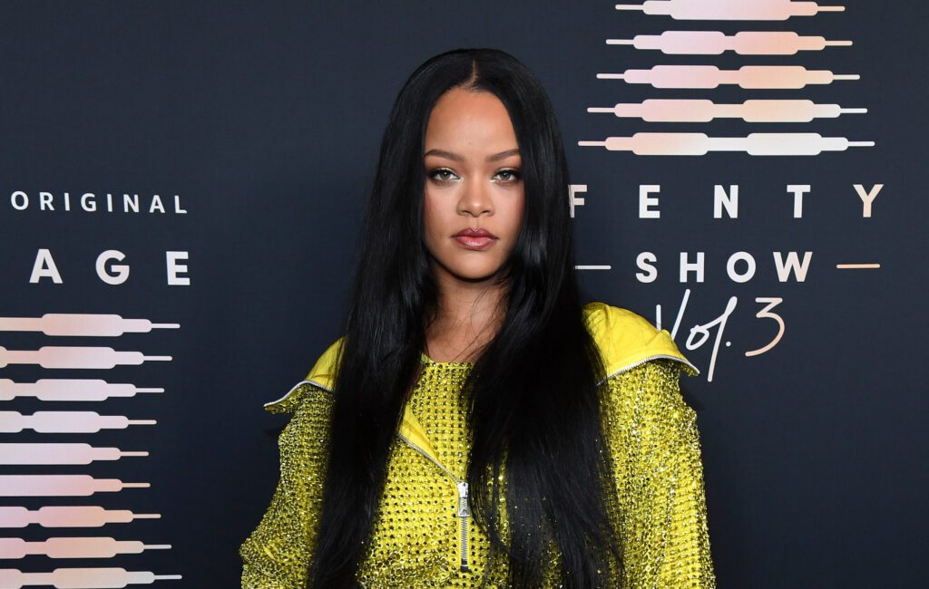 Rihanna tells paparazzi that new music is coming “soon soon soon”