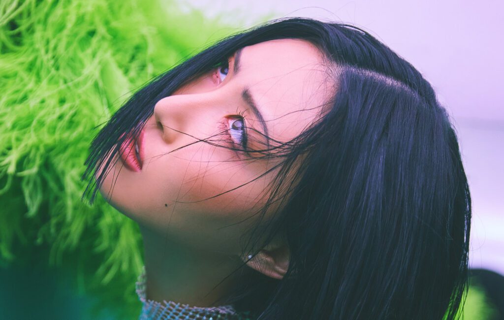 MAMAMOO's Hwasa dresses up as the Grinch for her cover of 'Jingle Bell Rock'