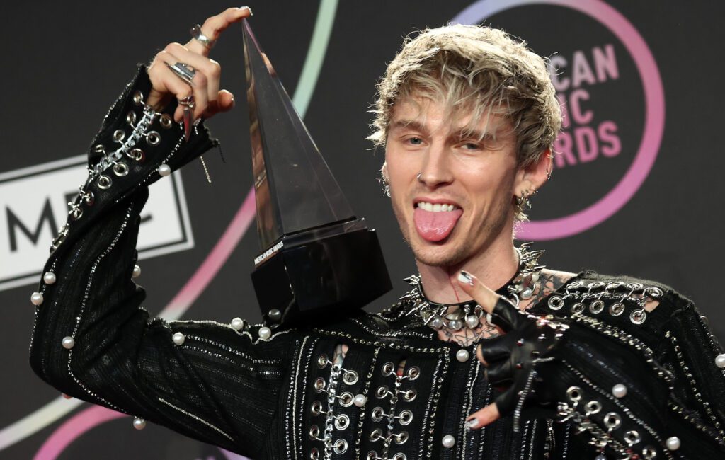 Machine Gun Kelly defends his pop-punk success: “I earned that shit”