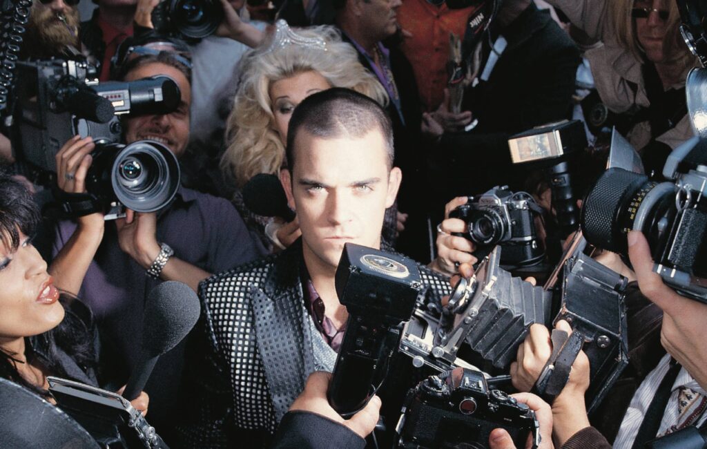 Robbie Williams announces 25th anniversary reissue of ‘Life Thru A Lens’