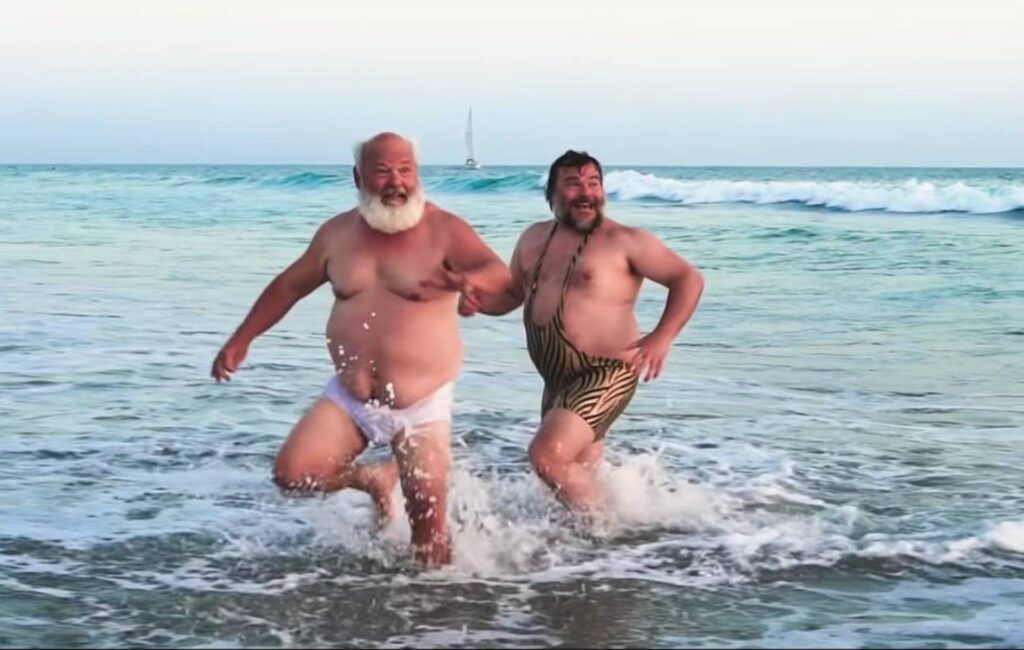Tenacious D frolic on the beach for their cover of  ‘Wicked Game’