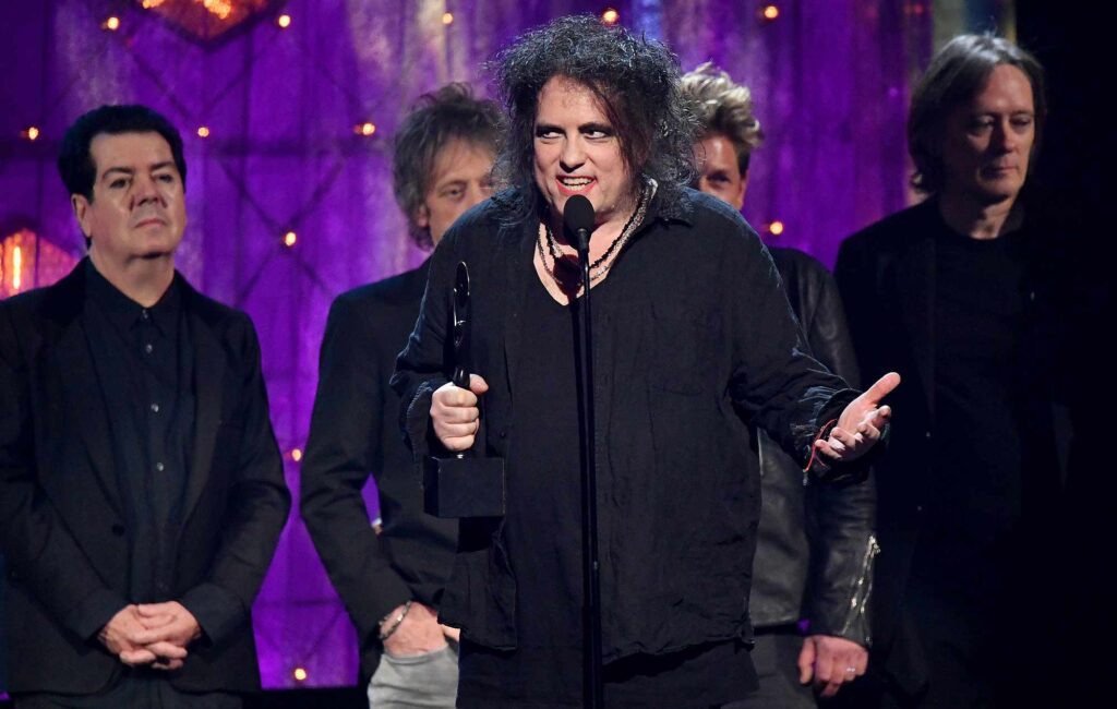 Inductees Lol Tolhurst, Robert Smith, Jason Cooper and Roger O'Donnell of The Cure speak onstage at the 2019 Rock & Roll Hall Of Fame Induction Ceremony - Show at Barclays Center on March 29, 2019 in New York City. (Photo by Mike Coppola/WireImage)