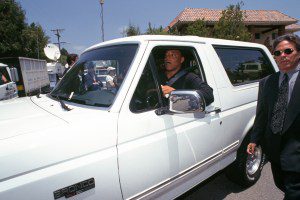 Al Cowlings arrives, in his Ford Bronco, at Nicole Simpson's funeral. He helped his friend OJ Simpson to flee in the same car after the double murder accusation. Los Angeles, 15th June 1994. (Photo by Ted Soqui/Sygma via Getty Images)