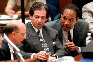 LOS ANGELES, CA - MAY 3:  This 03 May, 1995 file photo shows murder defendant O.J. Simpson (R) consulting with friend Robert Kardashian (C) and Alvin Michelson (L), the attorney representing Kardashian, during a hearing in Los Angeles.  It was announced 02 October, 2003 that Kardashian, a businessman and lawyer who was a key figure in the O.J. Simpson saga and part of his legal 