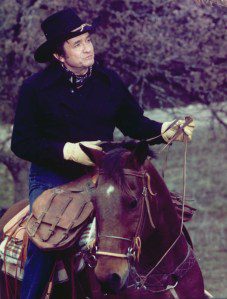 Johnny Cash rides a horse circa 1975.