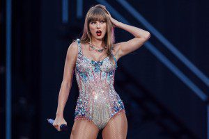 TOPSHOT - American singer and songwriter Taylor Swift performs on stage as part of her Eras Tour in Lisbon on May 24, 2024. (Photo by ANDRE DIAS NOBRE / AFP) (Photo by ANDRE DIAS NOBRE/AFP via Getty Images)