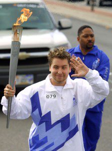 Lance Bass of ''N SYNC carries the Olympic Flame during the 2002 Salt Lake Olympic Torch Relay Jan. 15, 2002 in Newport Beach, CA.