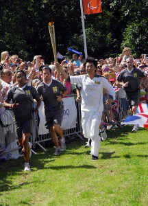 The Olympic torch arrives in Hornchurch in the London Borough of Havering on Sunday 22/07/2012 carried by Chinese pianist Lang Lang. (Photo by: Rob Welham/Universal History Archive/Universal Images Group via Getty Images)