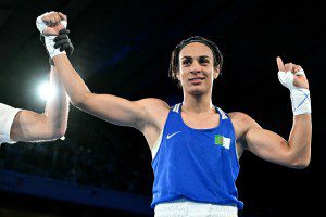 Algeria's Imane Khelif (Blue) reacts after beating Thailand's Janjaem Suwannapheng in the women's 66kg semi-final boxing match during the Paris 2024 Olympic Games at the Roland-Garros Stadium, in Paris on August 6, 2024. (Photo by MOHD RASFAN / AFP) (Photo by MOHD RASFAN/AFP via Getty Images)