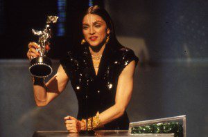 Madonna on stage at the '1998 MTV Video Music Awards' show, accepts an award for her video 'Ray of Light,' in Los Angeles, California on May 31, 1998.